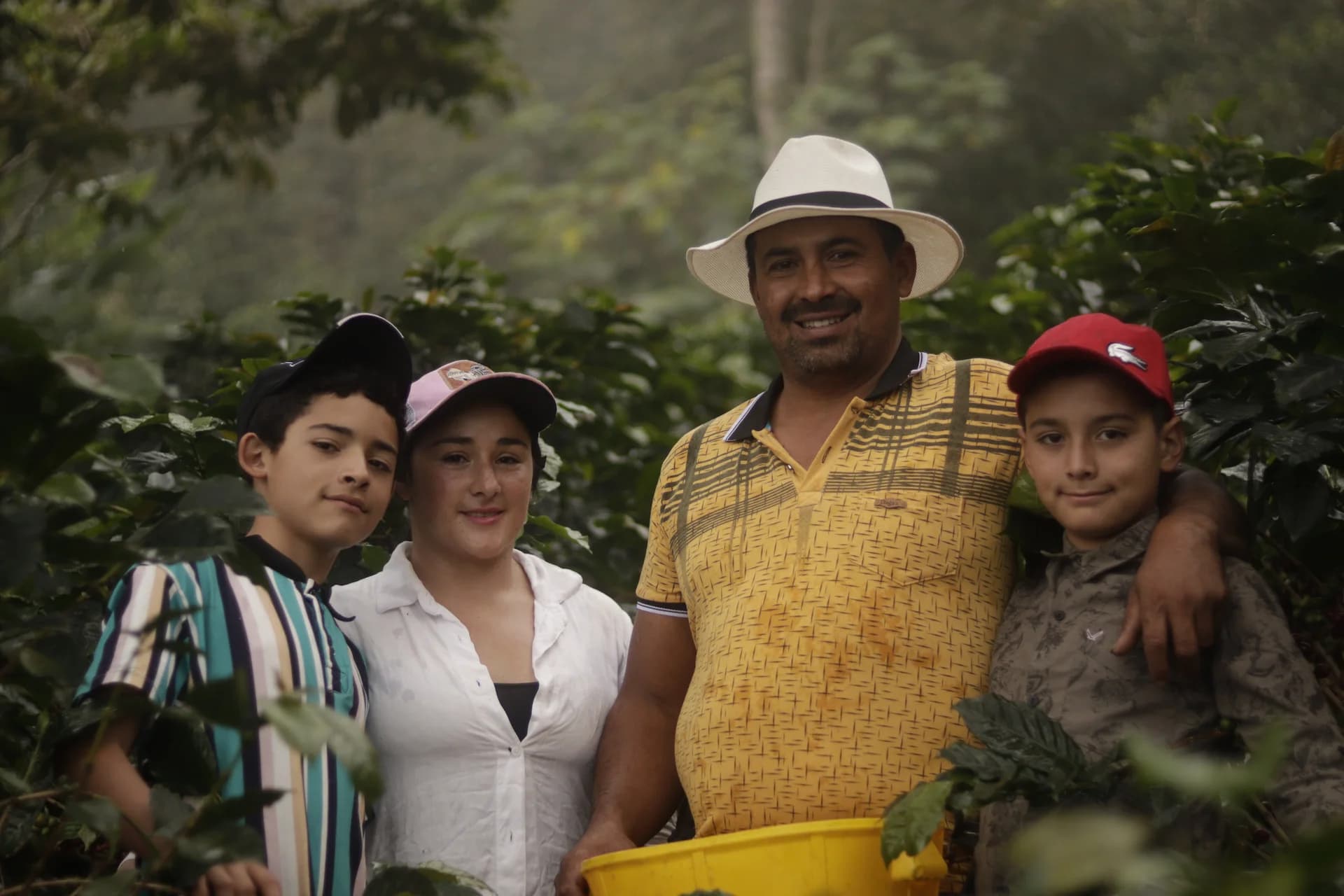 Proud coffee farmers at the source